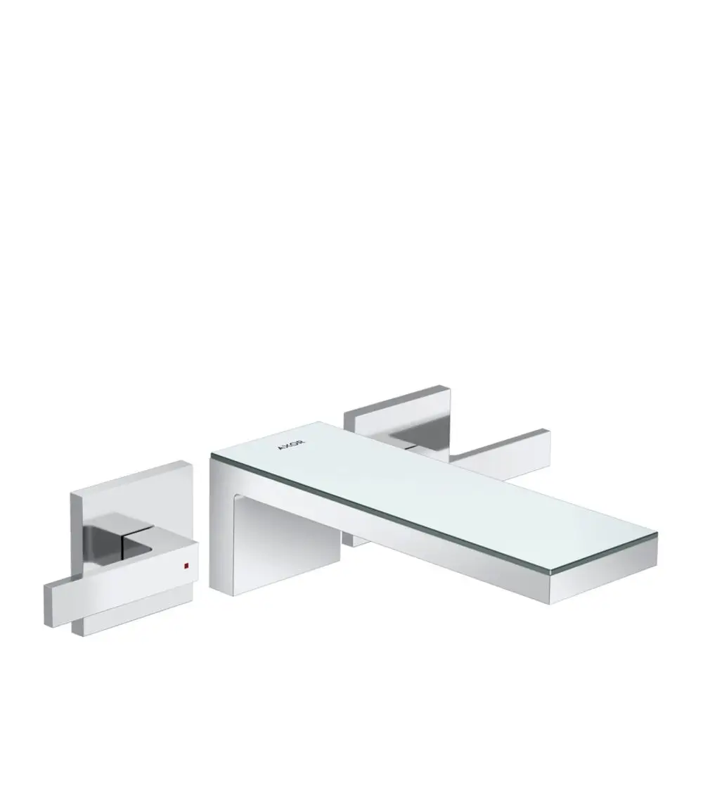 Wandmontierte Waschtischarmatur von AXOR mit drei Löchern, aus Chrom und Spiegelglas, inklusive einem langen Auslauf.